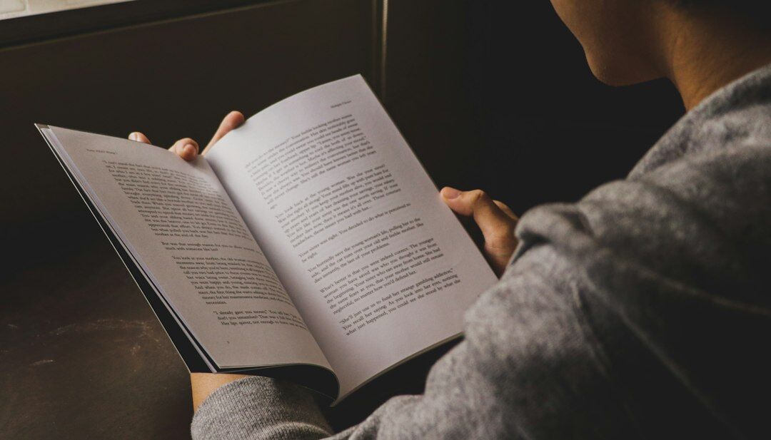person studying financial books