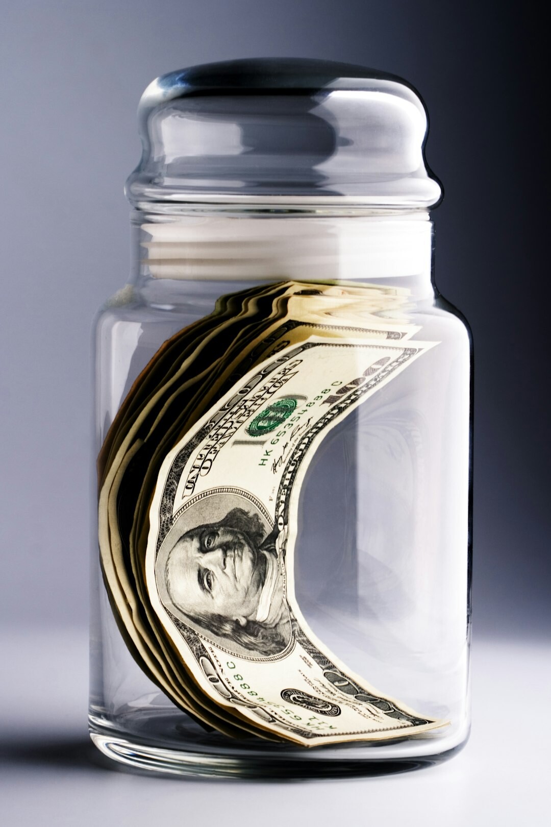 savings jar with coins
