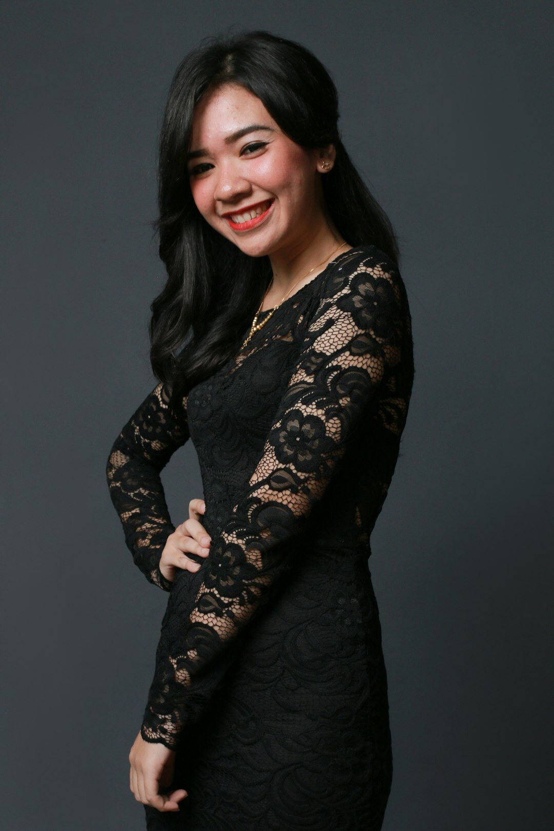Studio portrait of a professional Latina financial advisor smiling