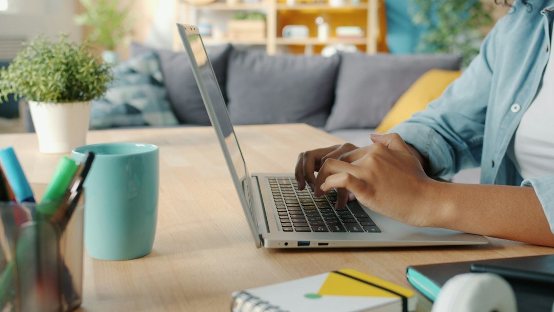 person budgeting at home desk